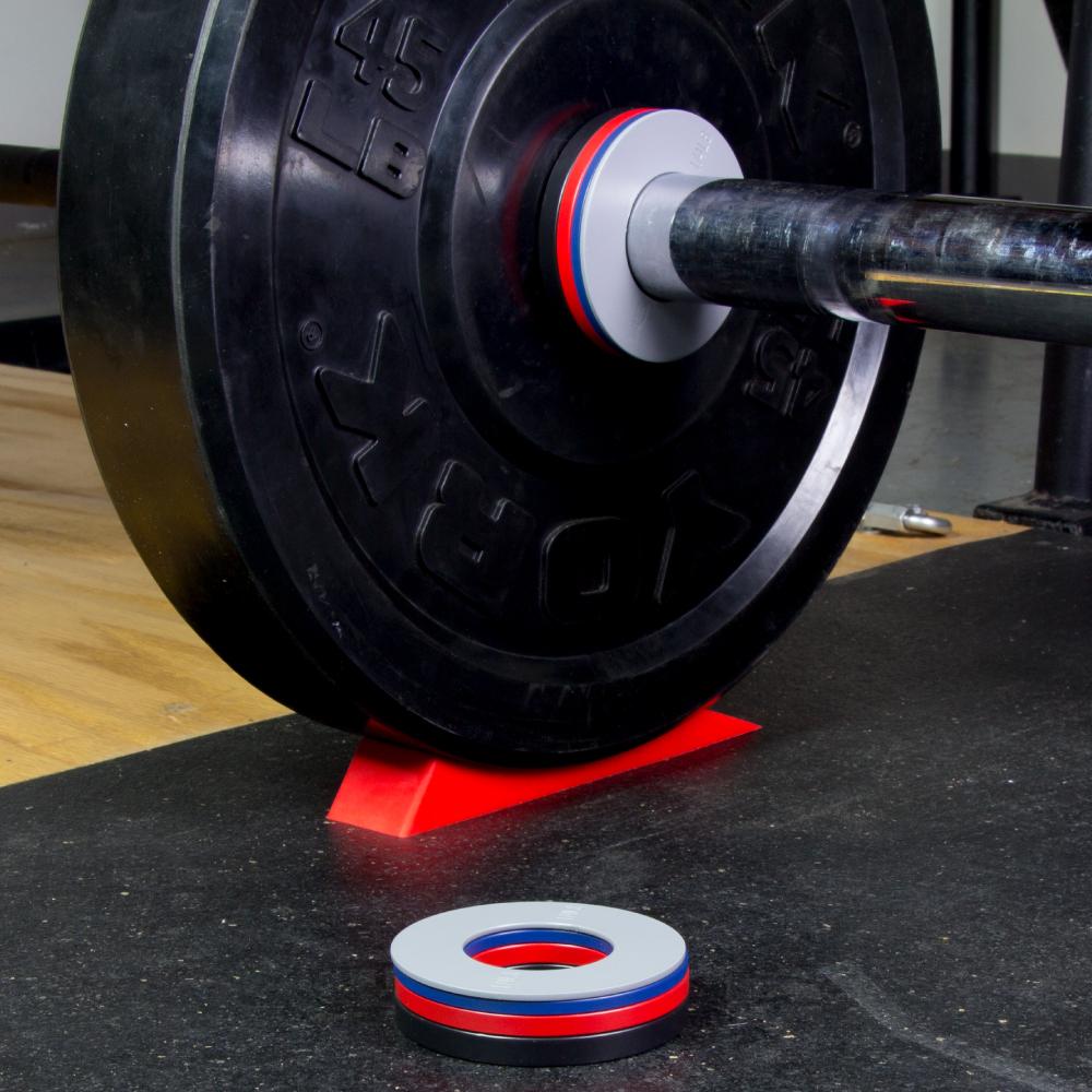 Fractional weights outlet for olympic bar